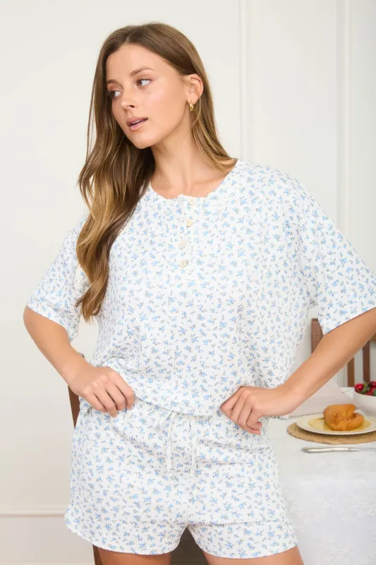 FLORAL SHORT SLEEVE HENLEY KNIT TOP (PRE-ORDER) sold by Blu Pepper