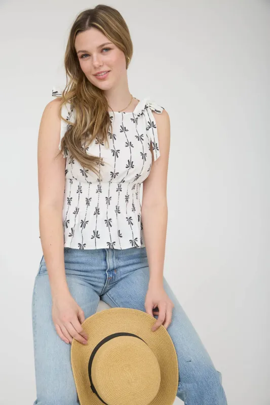 BOW LINE PATTERN TIE SHOULDER SLEEVELESS BLOUSE sold by Blu Pepper