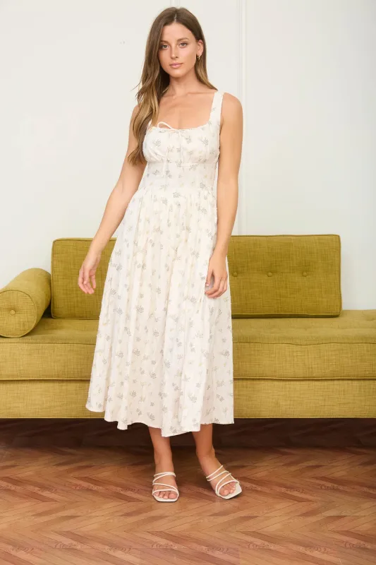 FLORAL CLIP DOT FRONT TIE CORSET DETAIL MIDI DRESS sold by Blu Pepper