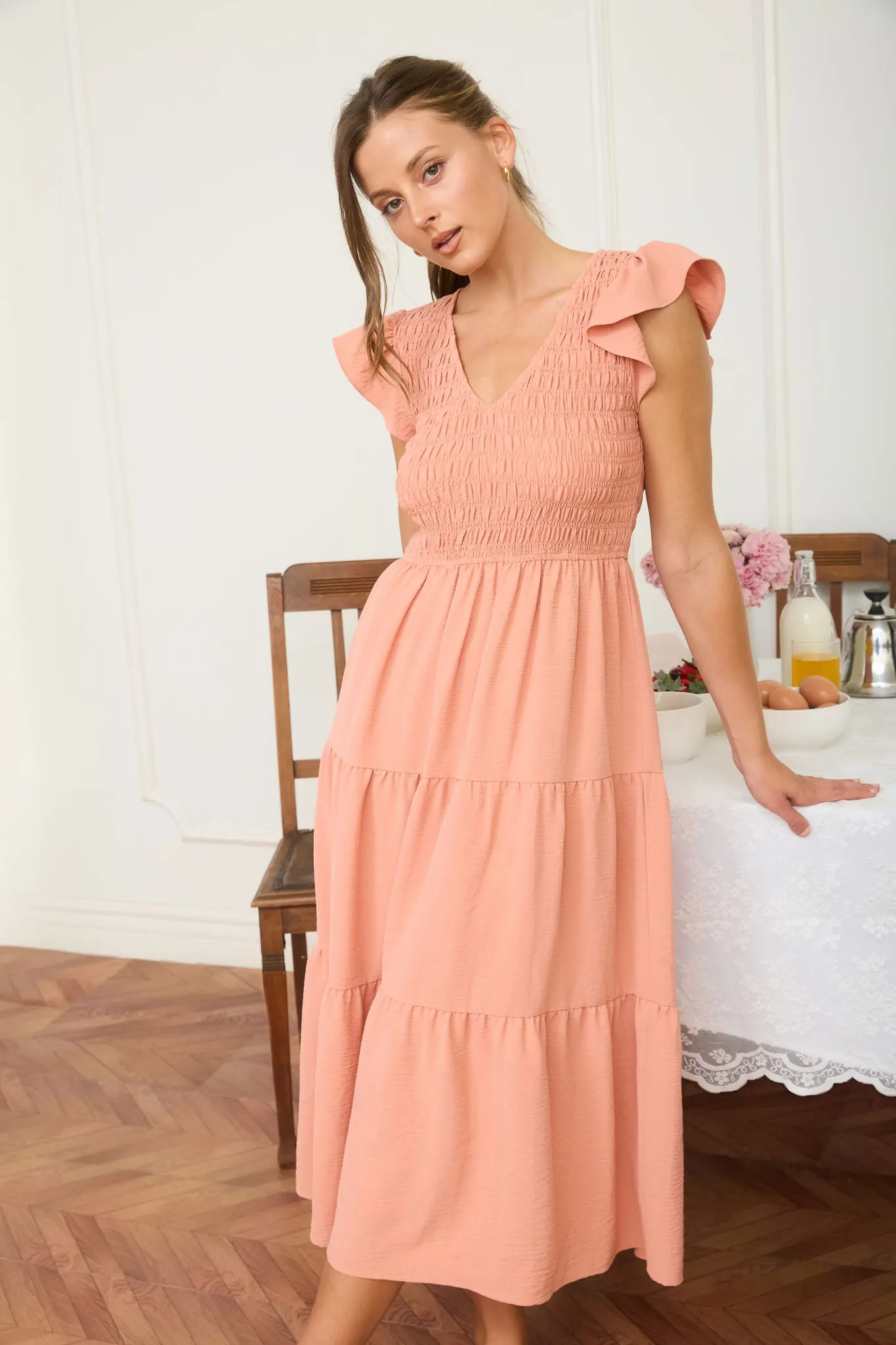 FLUTTER SLEEVE V NECK SMOCKED MIDI DRESS sold by Blu Pepper