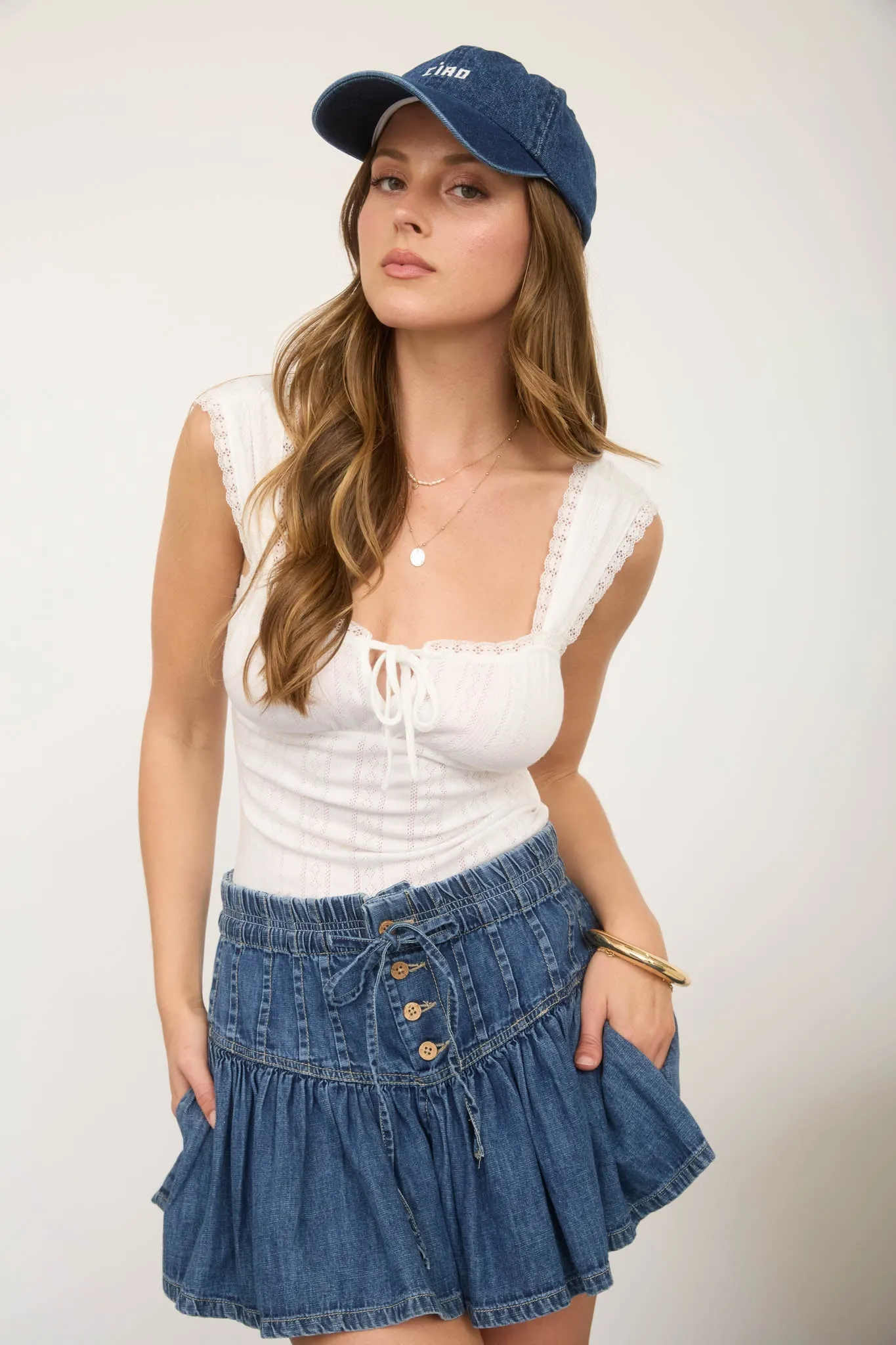 POINTELLE LACE TRIM FRONT TIE SLEEVELESS KNIT TOP sold by Blu Pepper