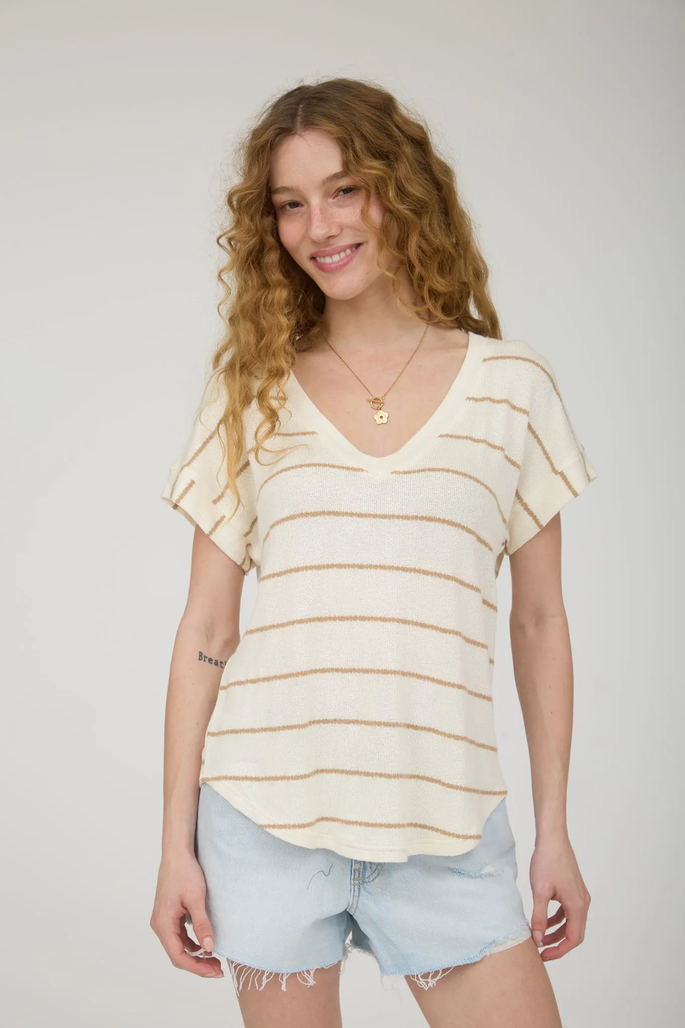 PLUS STRIPE V NECK CUFFED SHORT SLEEVE KNIT TOP sold by Blu Pepper