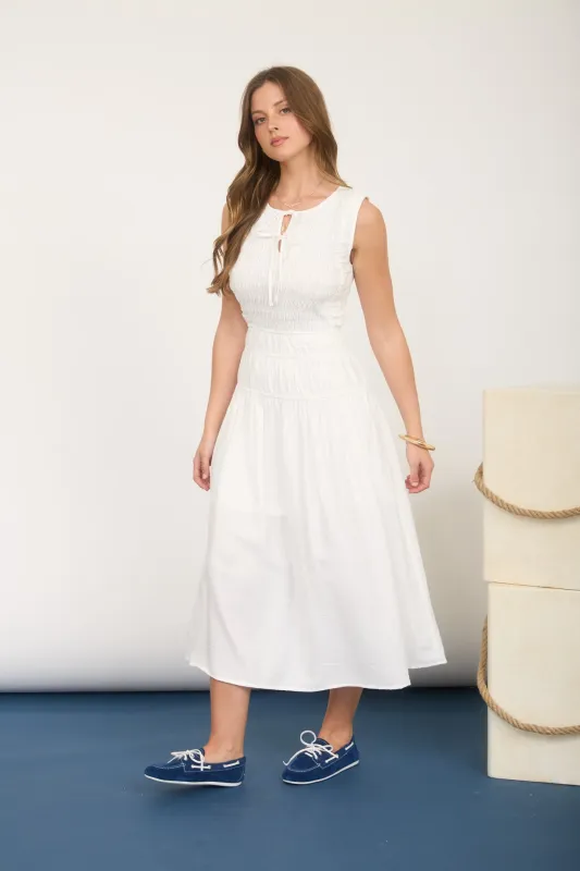 FRONT TIE SMOCKED SLEEVELESS SHIRRED MIDI DRESS (PRE-ORDER) sold by Blu Pepper