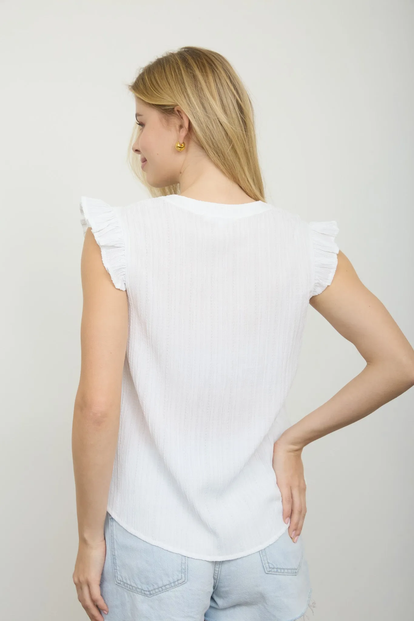 EMBROIDERED FRONT SPLIT NECK PLISSE TOP sold by Blu Pepper product image thumbnail 2