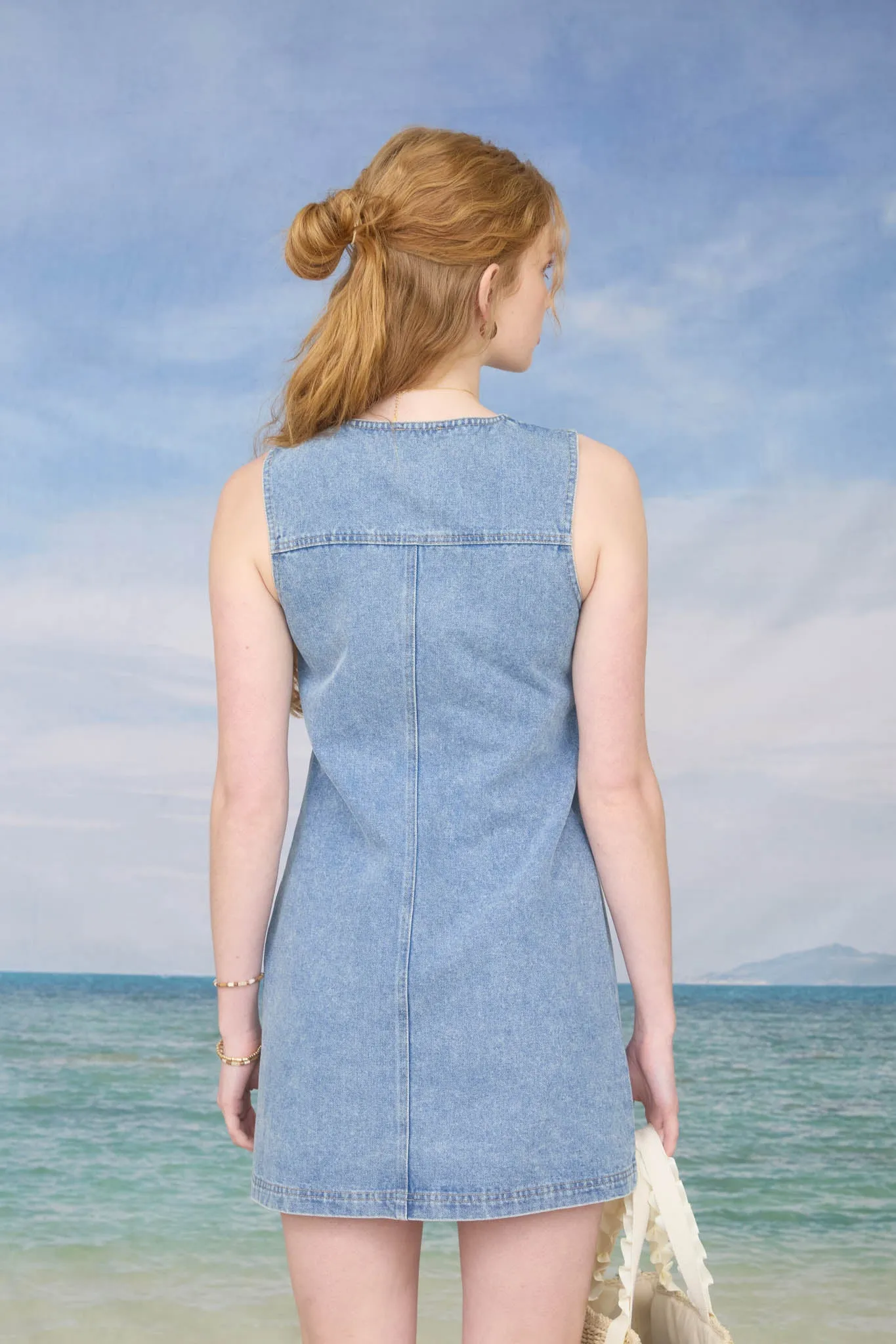 ROUND NECK SLEEVELESS BUTTON UP DENIM MINI DRESS sold by Blu Pepper product image thumbnail 2
