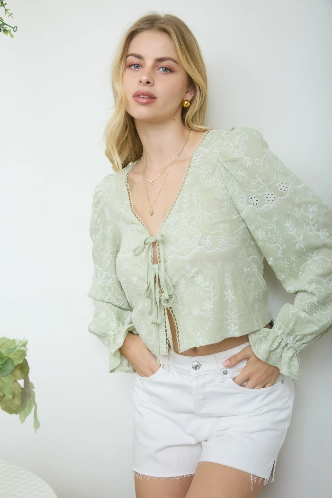EMBROIDERED PATTERN LONG SLEEVE FRONT TIE CROP TOP sold by Blu Pepper product image thumbnail 4