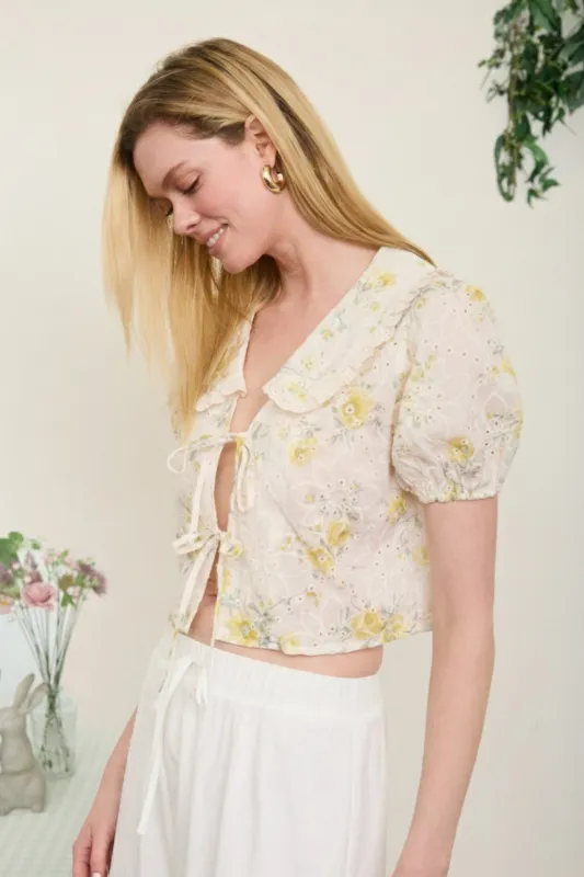FLORAL EYELET PATTERN COLLARED FRONT TIE BLOUSE sold by Blu Pepper