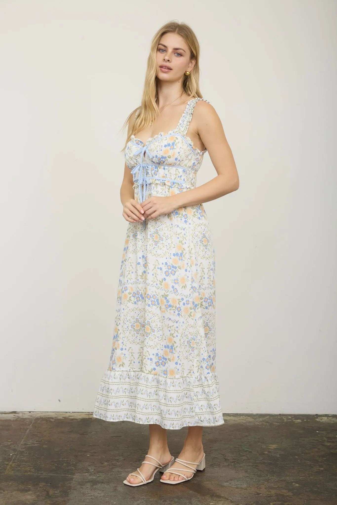 BORDER FLORAL SLEEVELESS FRONT TIE MIDI DRESS (PRE-ORDER) sold by Blu Pepper product image thumbnail 3