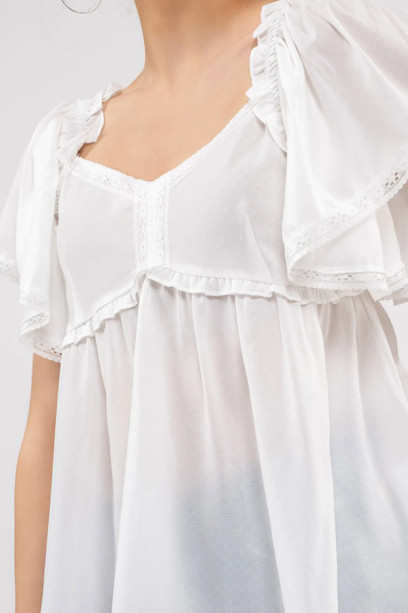LACE TRIM SLEEVES WOVEN TOP sold by Blu Pepper product image thumbnail 4