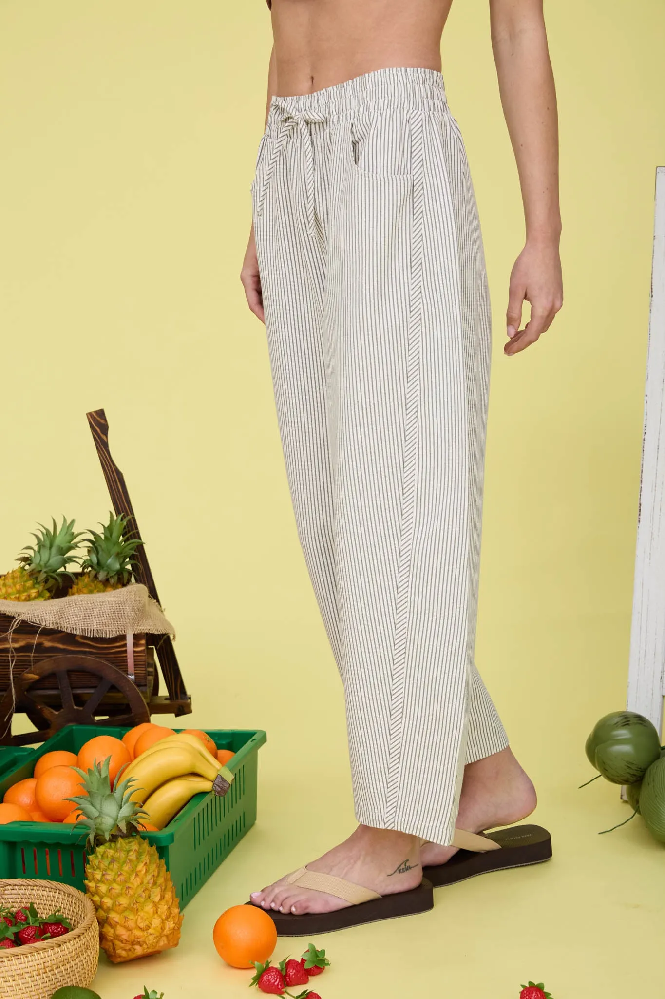 STRIPE ELASTIC WAIST WITH DRAWSTRING BAGGY PANTS sold by Blu Pepper