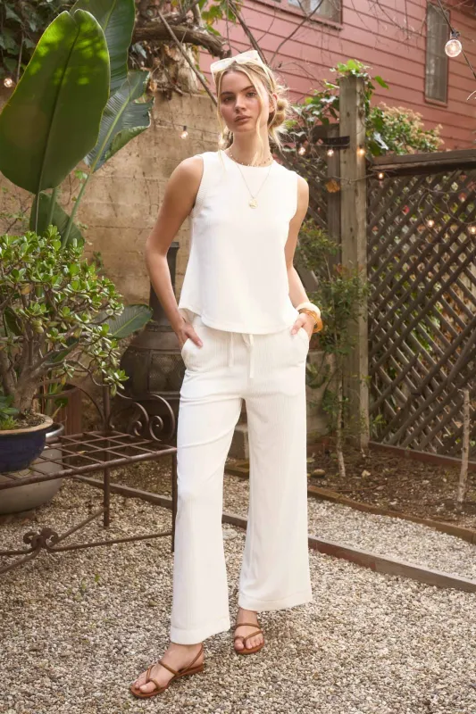 BACK BUTTON DETAIL SLEEVELESS RIBBED KNIT TOP (PRE-ORDER) made by Blu Pepper