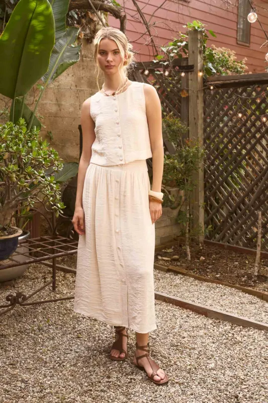 SMOCKED WAIST RUFFLE DETAIL BUTTON DOWN MIDI SKIRT made by Blu Pepper