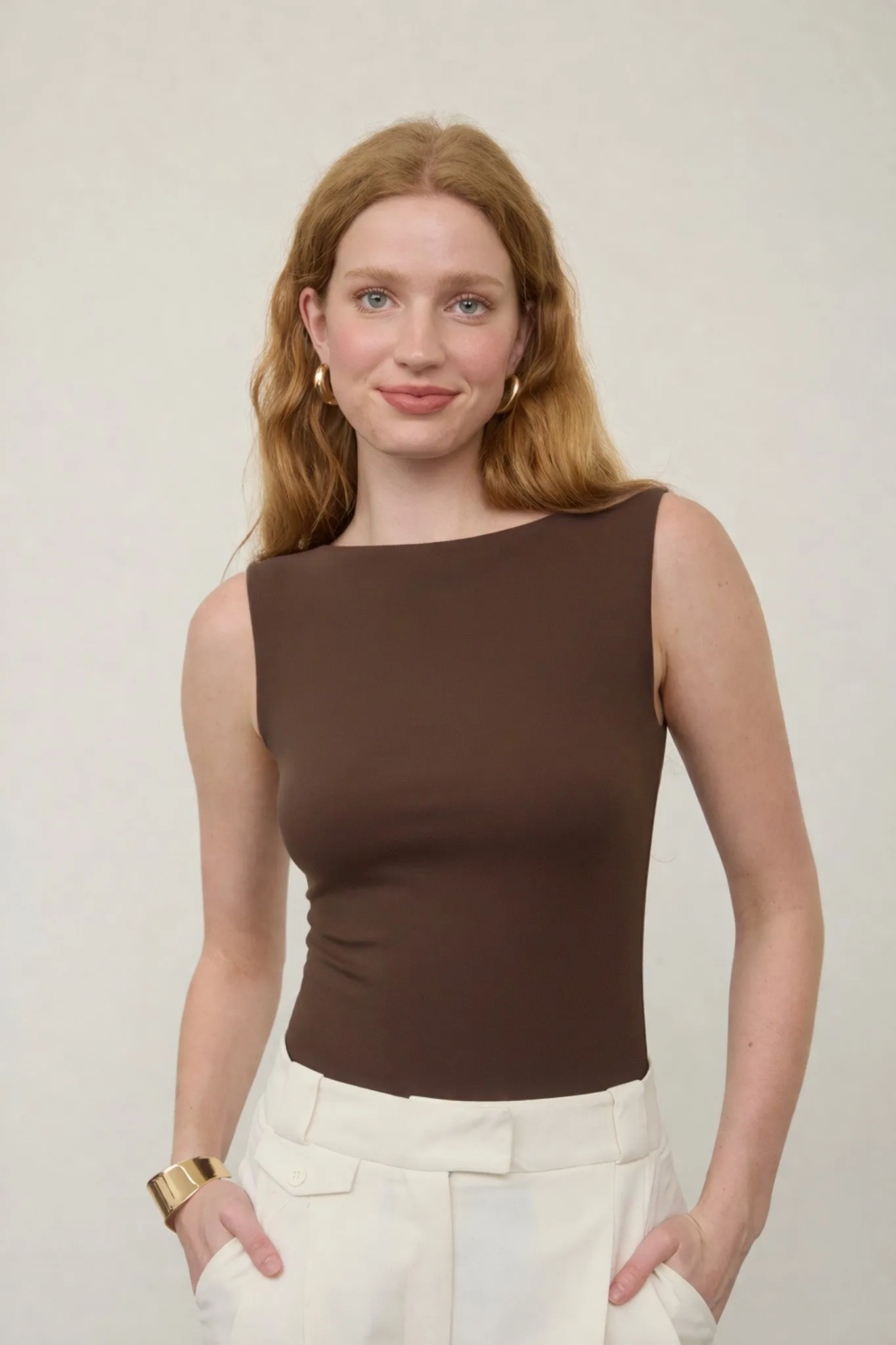 SEAMLESS BOAT NECK SLEEVELESS KNIT BODYSUIT sold by Blu Pepper