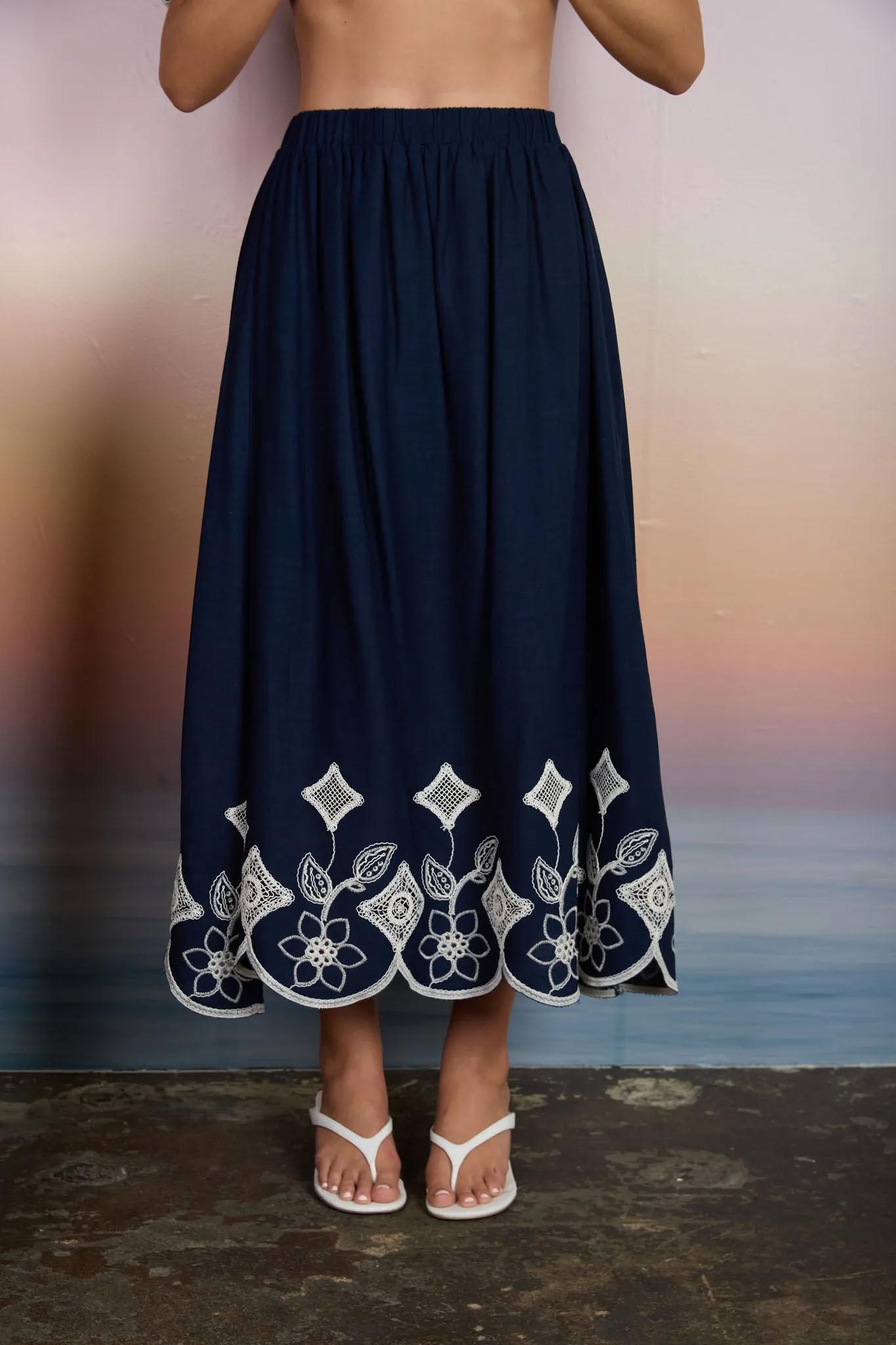 FLORAL EYELET EMBROIDERY SCALLOPED MIDI SKIRT (PRE-ORDER) sold by Blu Pepper