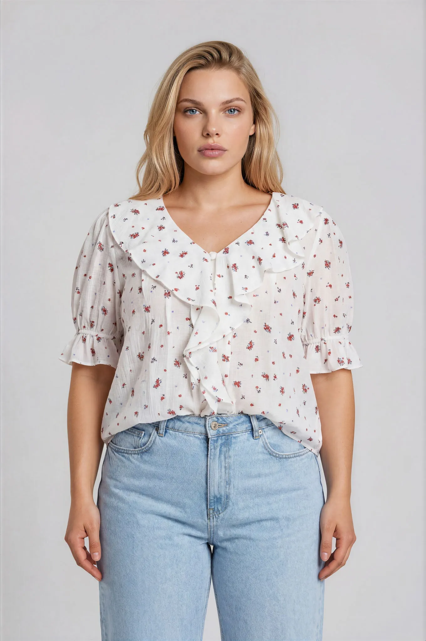 PLUS FLORAL RUFFLED V NECK 1/2 SLEEVE BLOUSE sold by Blu Pepper