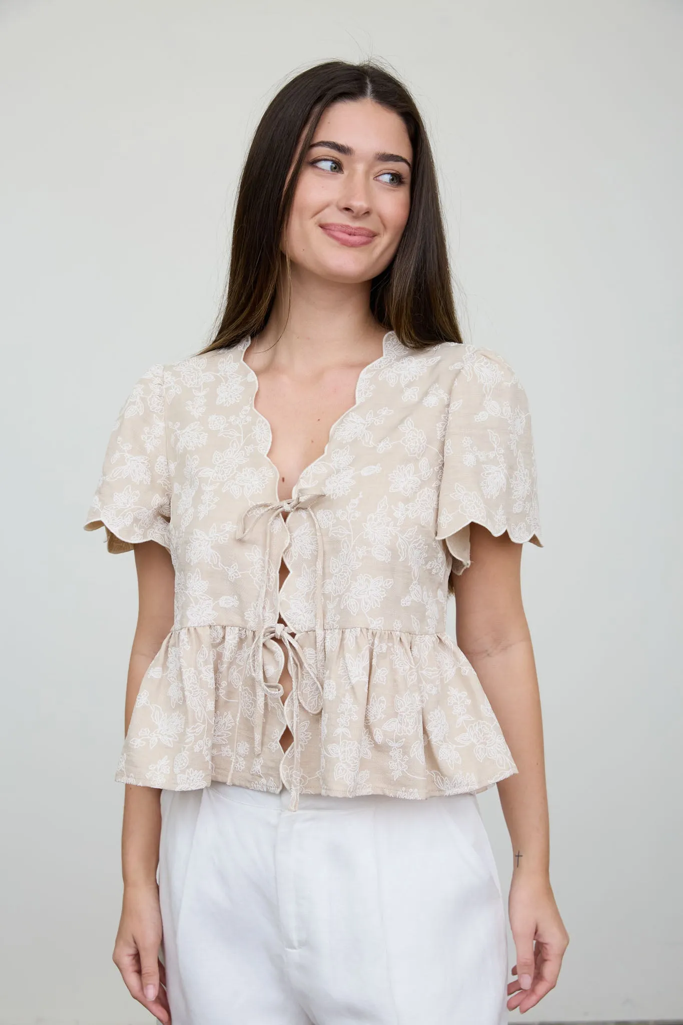 FLORAL EMBROIDERY FRONT TIE SCALLOPED PEPLUM TOP sold by Blu Pepper product image thumbnail 5
