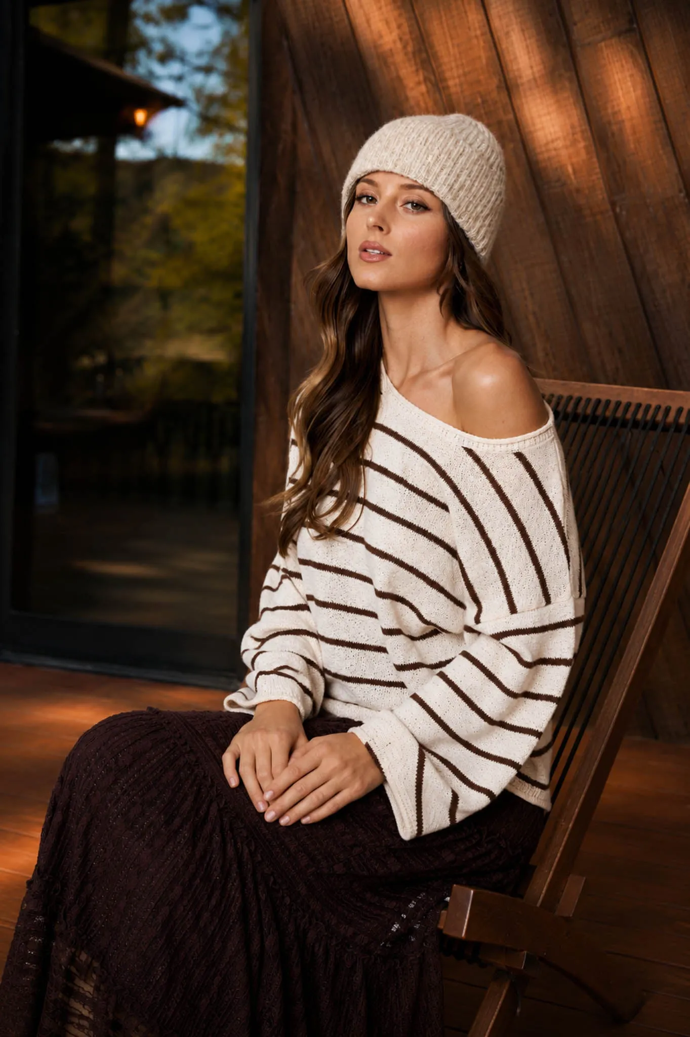 STRIPE TEXTURED RAW EDGE LONG SLEEVE KNIT SWEATER sold by Blu Pepper