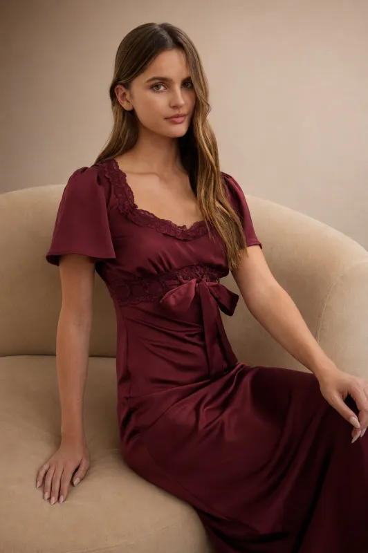 LACE TRIM PUFF BELL SLEEVE BOW TIE MIDI DRESS made by Blu Pepper