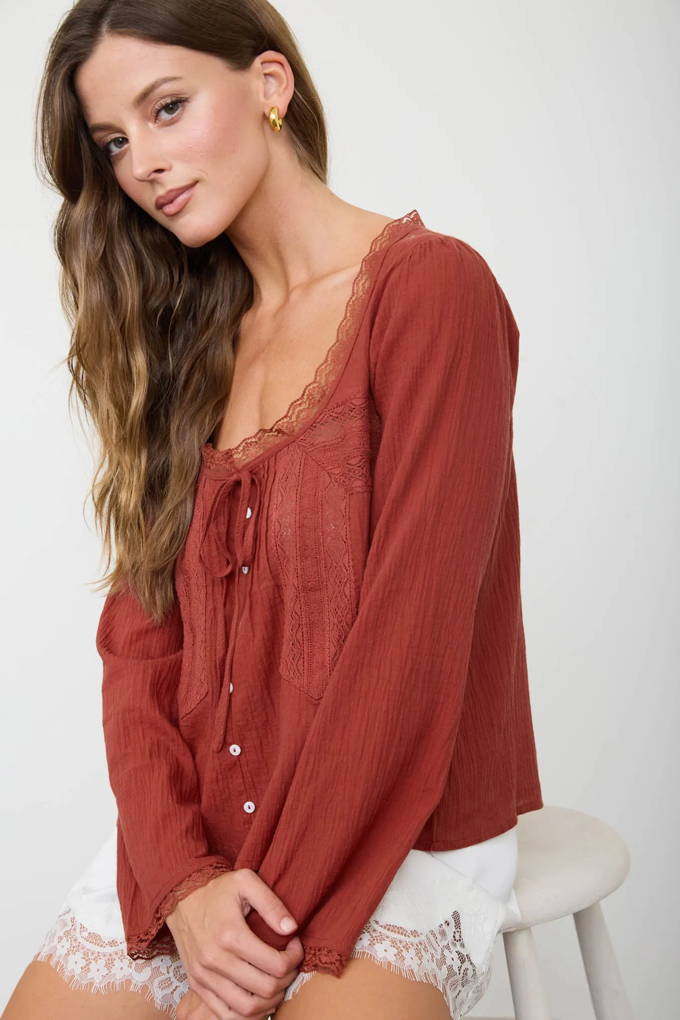 SCOOP NECK FRONT TIE LACE TRIM LONG SLEEVE TOP sold by Blu Pepper product image thumbnail 5