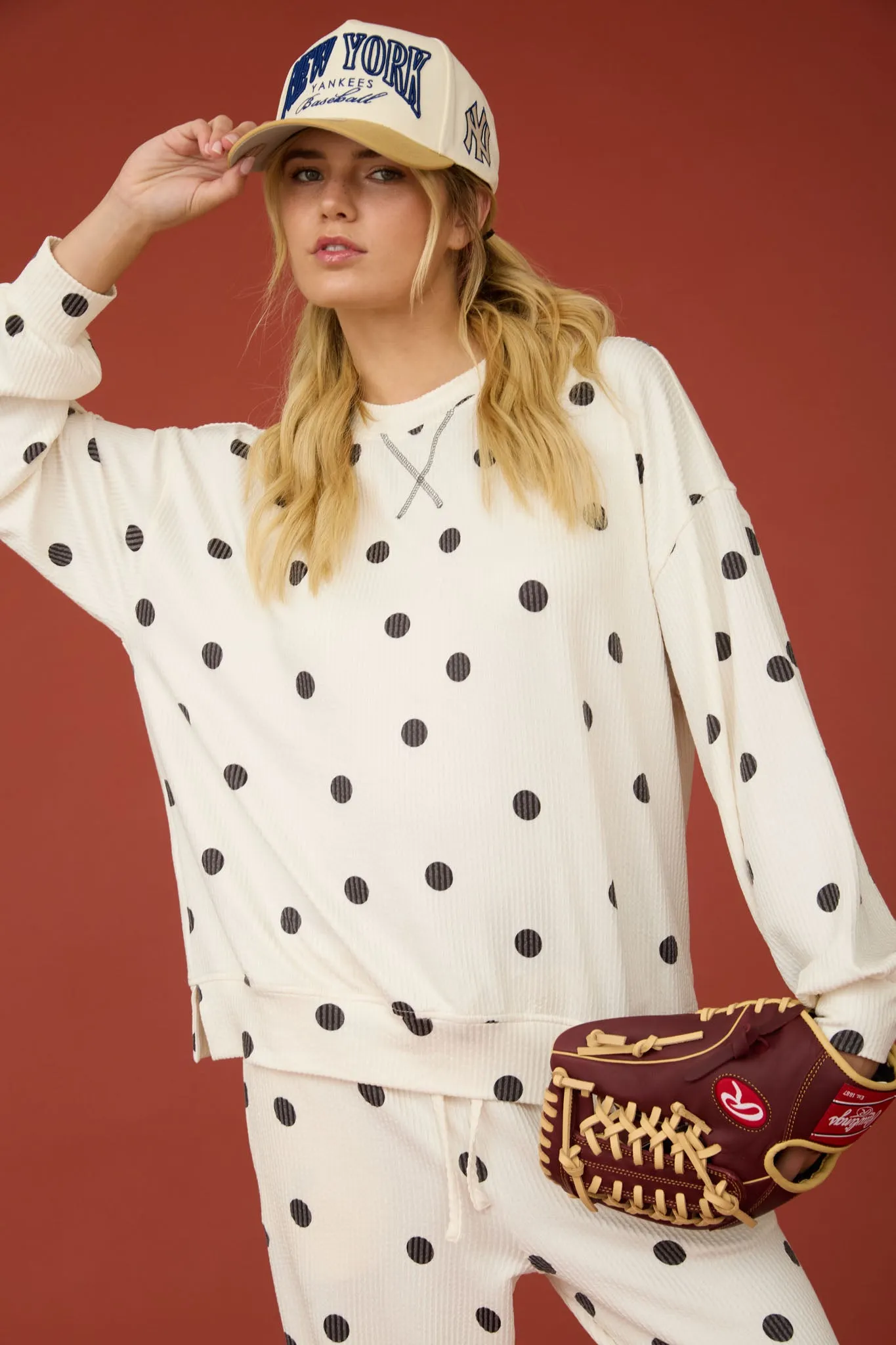 POLKA DOT TEXTURED LONG SLEEVE CREW KNIT TOP sold by Blu Pepper