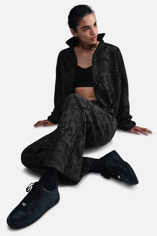Women's Mid-Rise Jacquard Track Pants Black made by Nike
