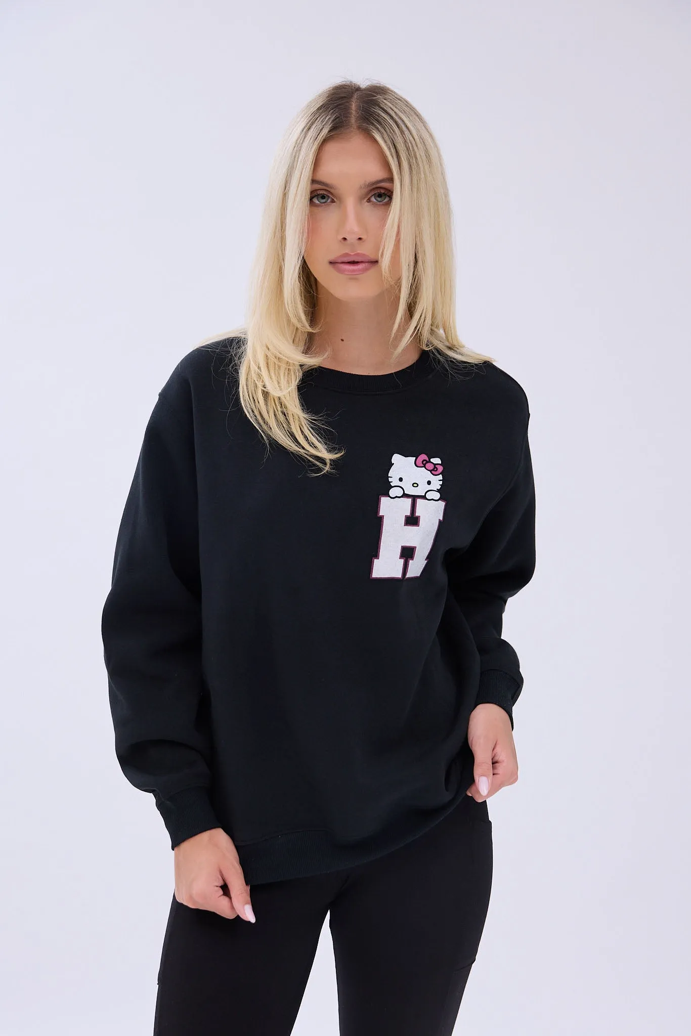 Hello Kitty H Graphic Crew Neck Relaxed Sweatshirt sold by Bluenotes