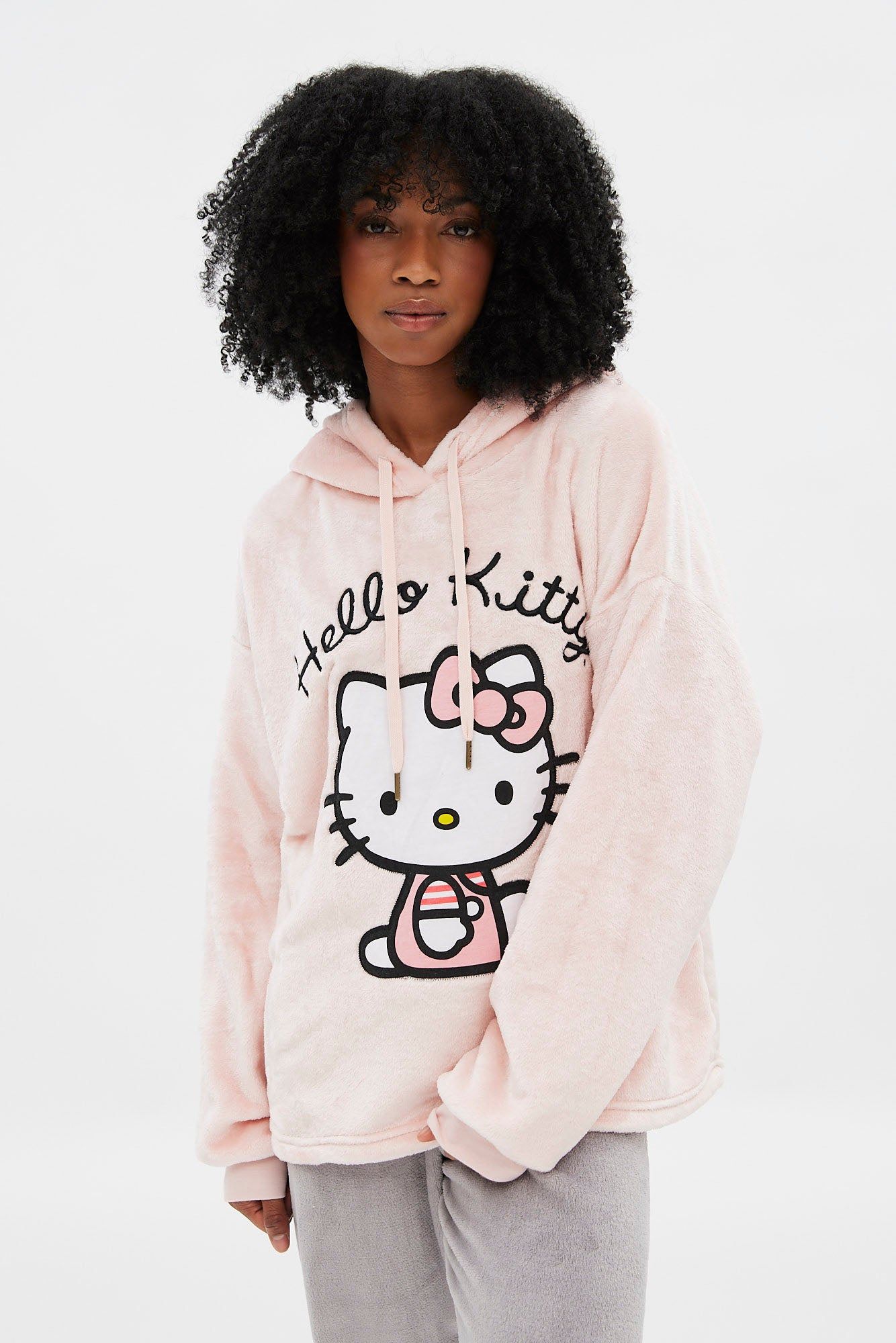 Hello Kitty Graphic Plush Pullover Hoodie sold by Bluenotes