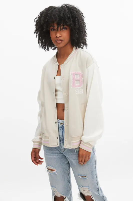 Embroidered Button-Up Varsity Jacket sold by Bluenotes
