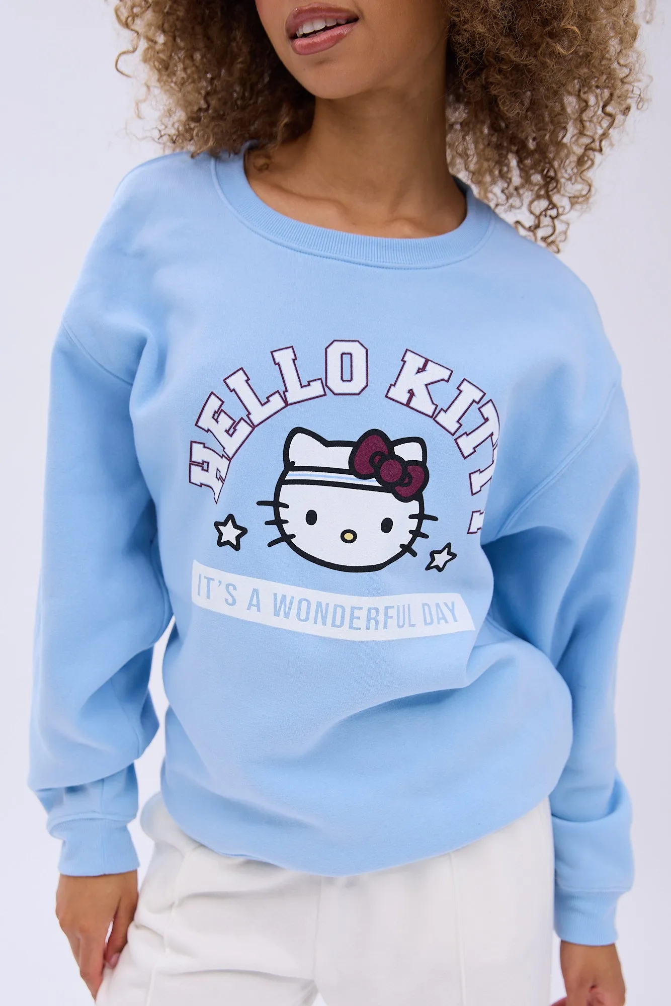 Hello Kitty It's A Wonderful Day Graphic Crew Neck Relaxed Sweatshirt sold by Bluenotes product image thumbnail 3