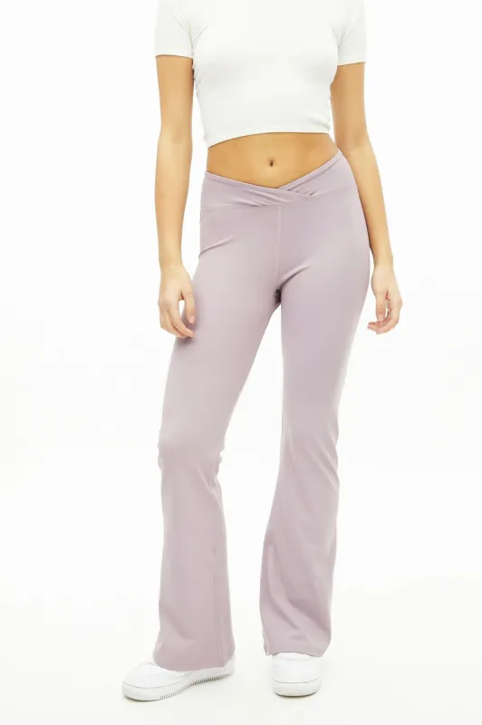 AERO High Rise Crossover Flare Legging sold by Bluenotes