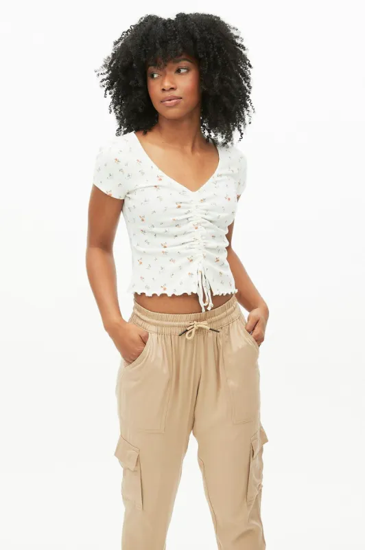Short Sleeve V-Neck Cinched Flyaway Top sold by Bluenotes
