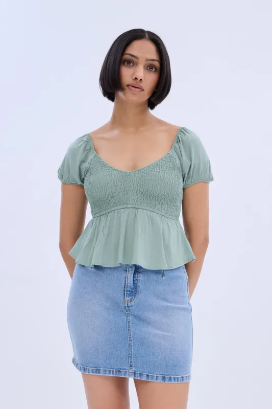 Smocked Cap Sleeve Peplum Top sold by Bluenotes