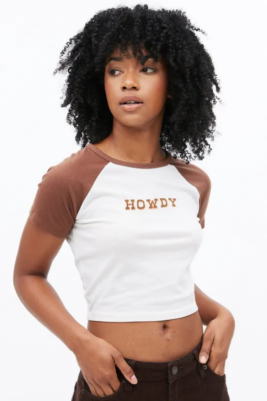 Howdy Graphic Raglan Sleeve Baby Tee sold by Bluenotes