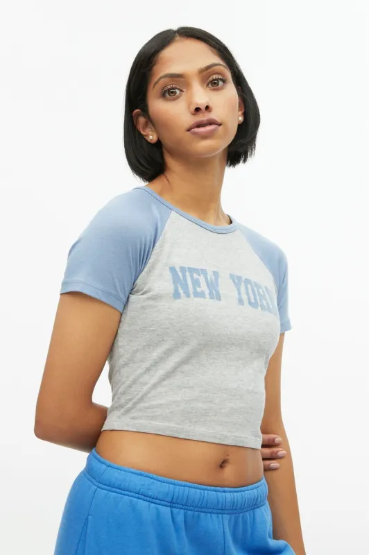 New York Graphic Raglan Sleeve Baby Tee sold by Bluenotes