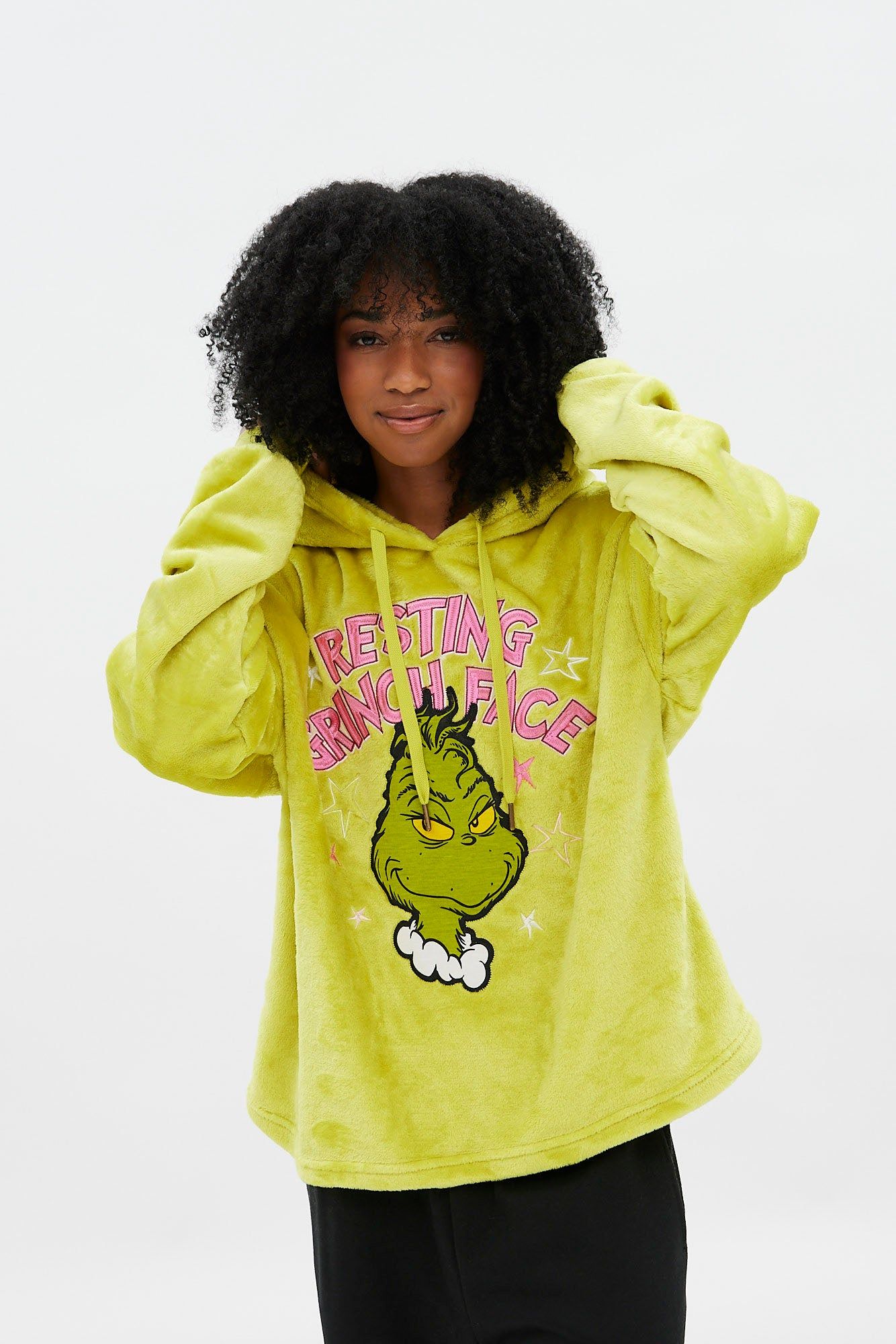 The Grinch Graphic Plush Pullover Hoodie sold by Bluenotes