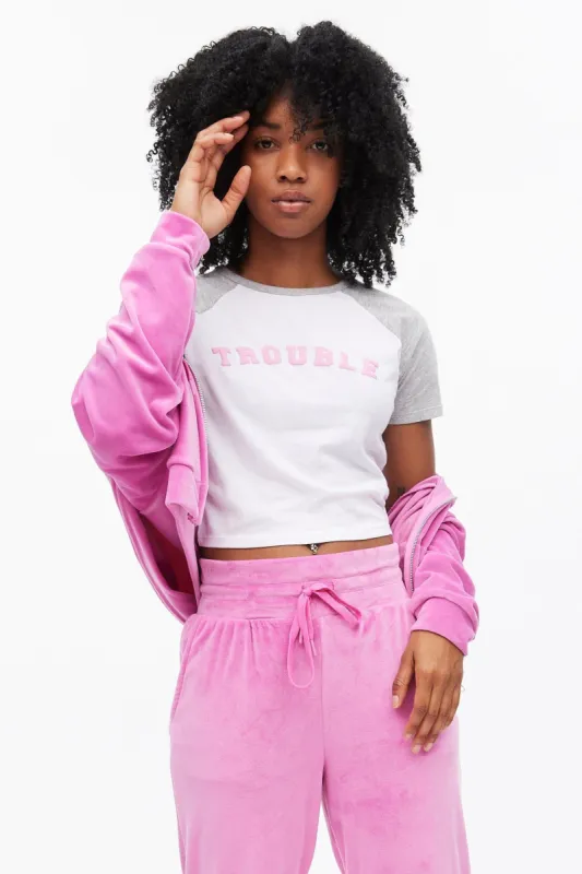 Trouble Graphic Raglan Sleeve Baby Tee sold by Bluenotes