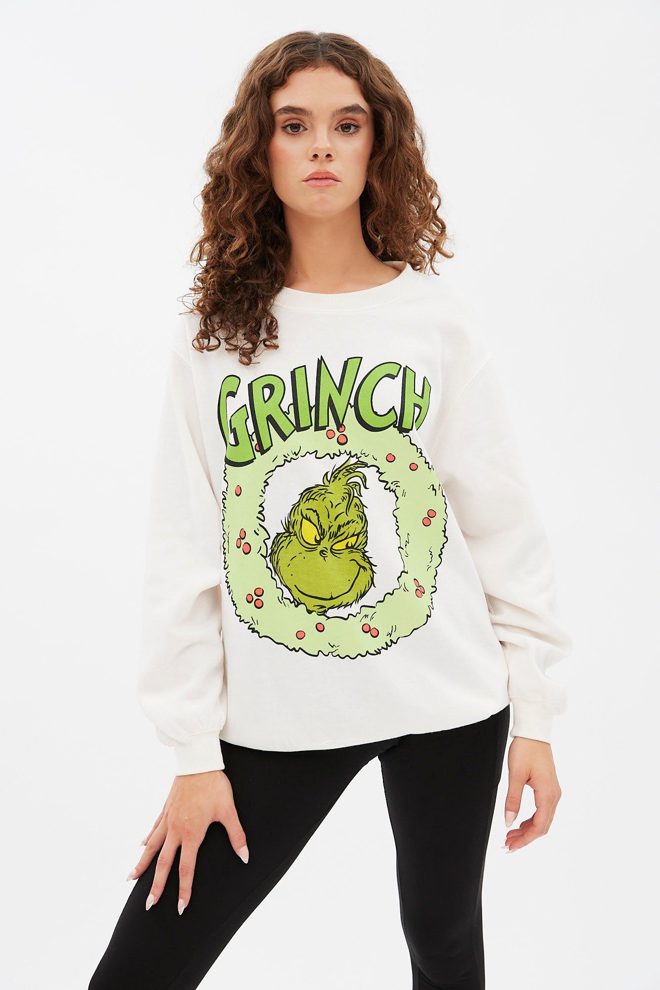 The Grinch Wreath Graphic Oversized Pullover Sweatshirt sold by Bluenotes