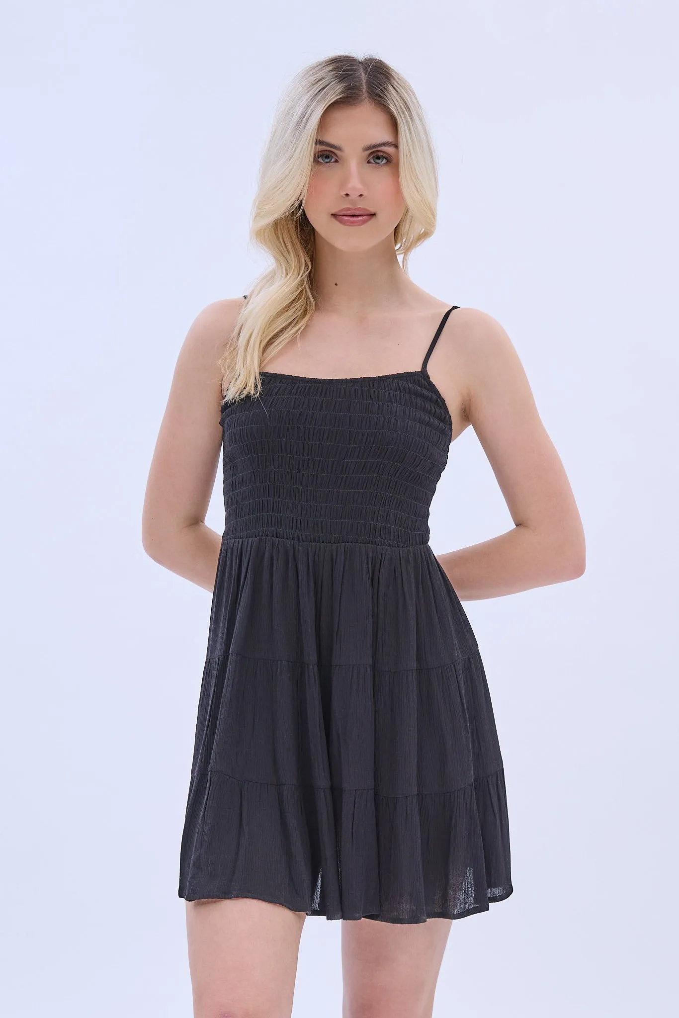 Smocked Tiered Mini Dress sold by Bluenotes
