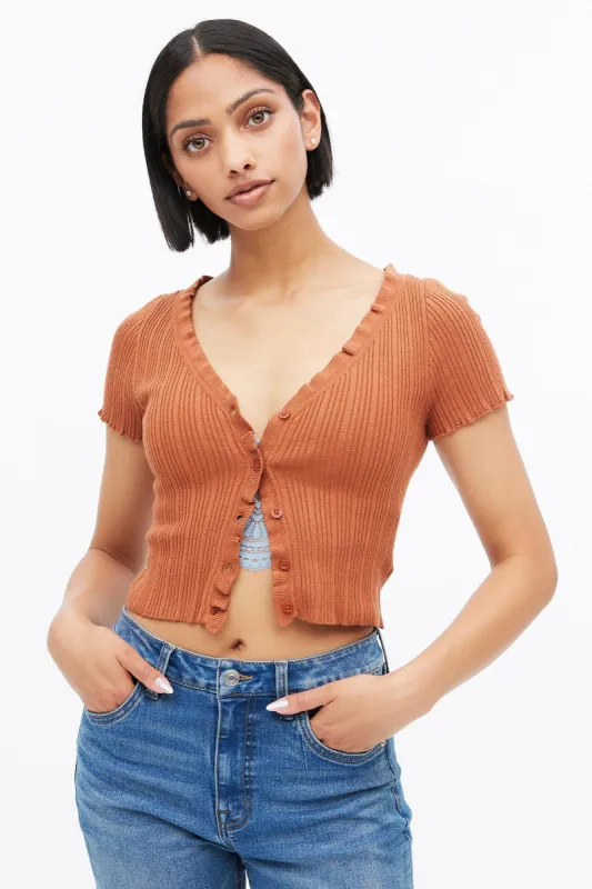 Ruffle Trim Short Sleeve Button-Up Cardigan sold by Bluenotes