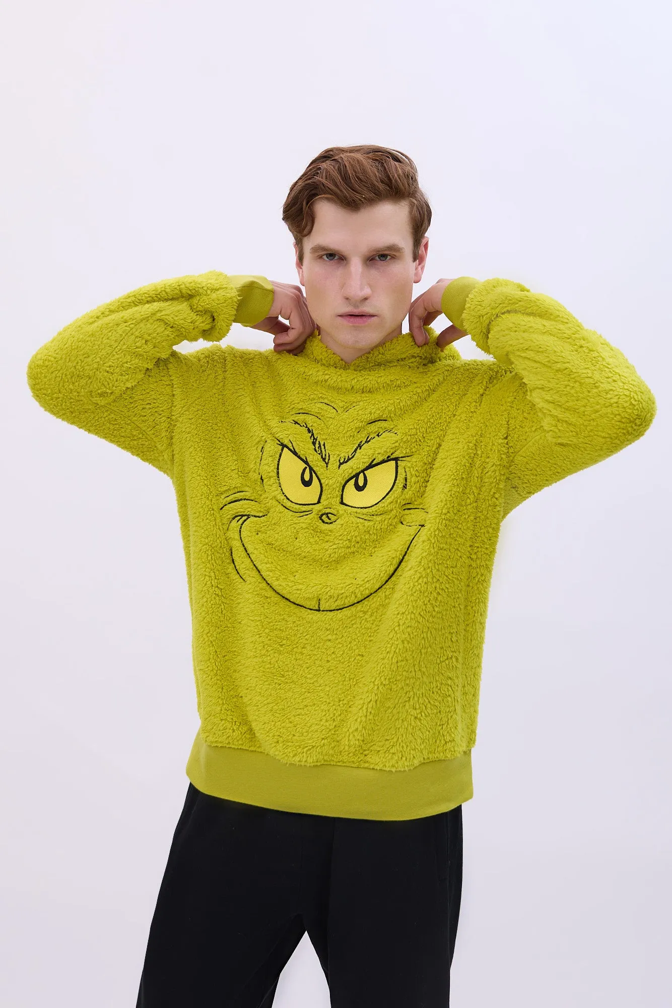 The Grinch Sherpa Hoodie sold by Bluenotes