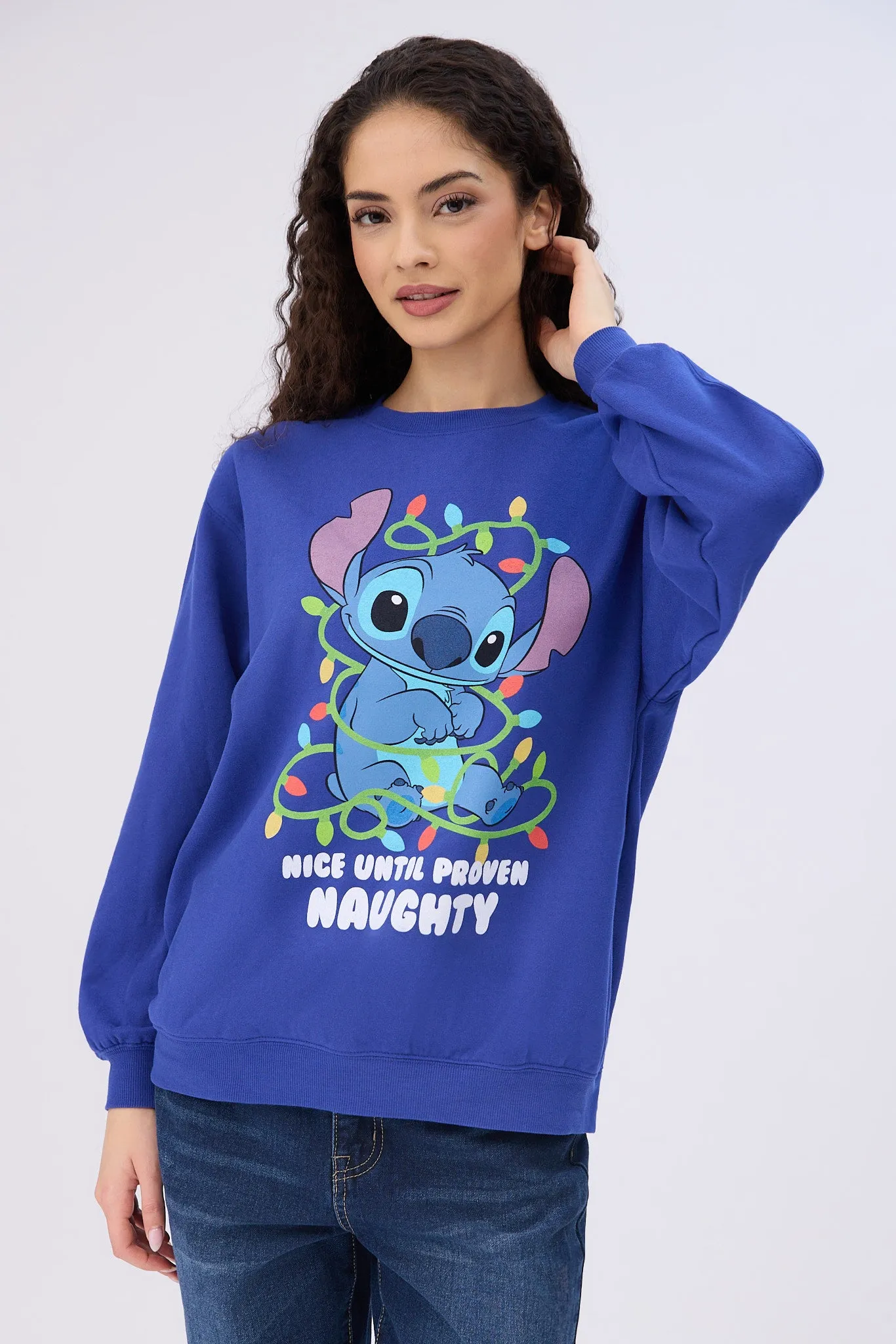 Stitch Nice Until Proven Naughty Graphic Crew Neck Sweatshirt sold by Bluenotes