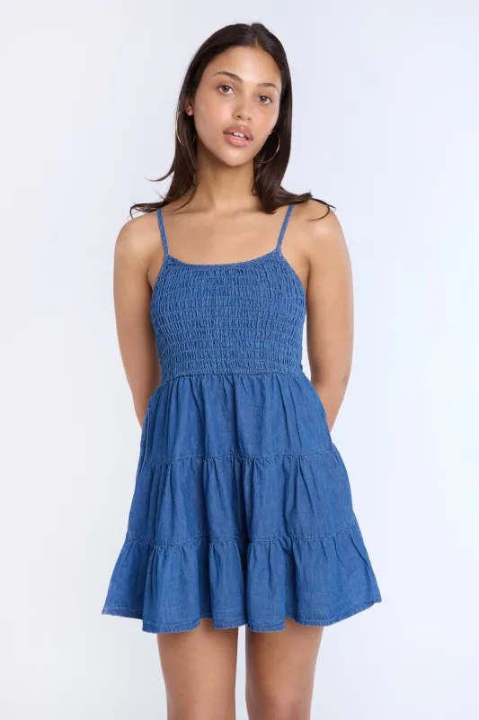 Chambray Smocked Tiered Mini Dress sold by Bluenotes
