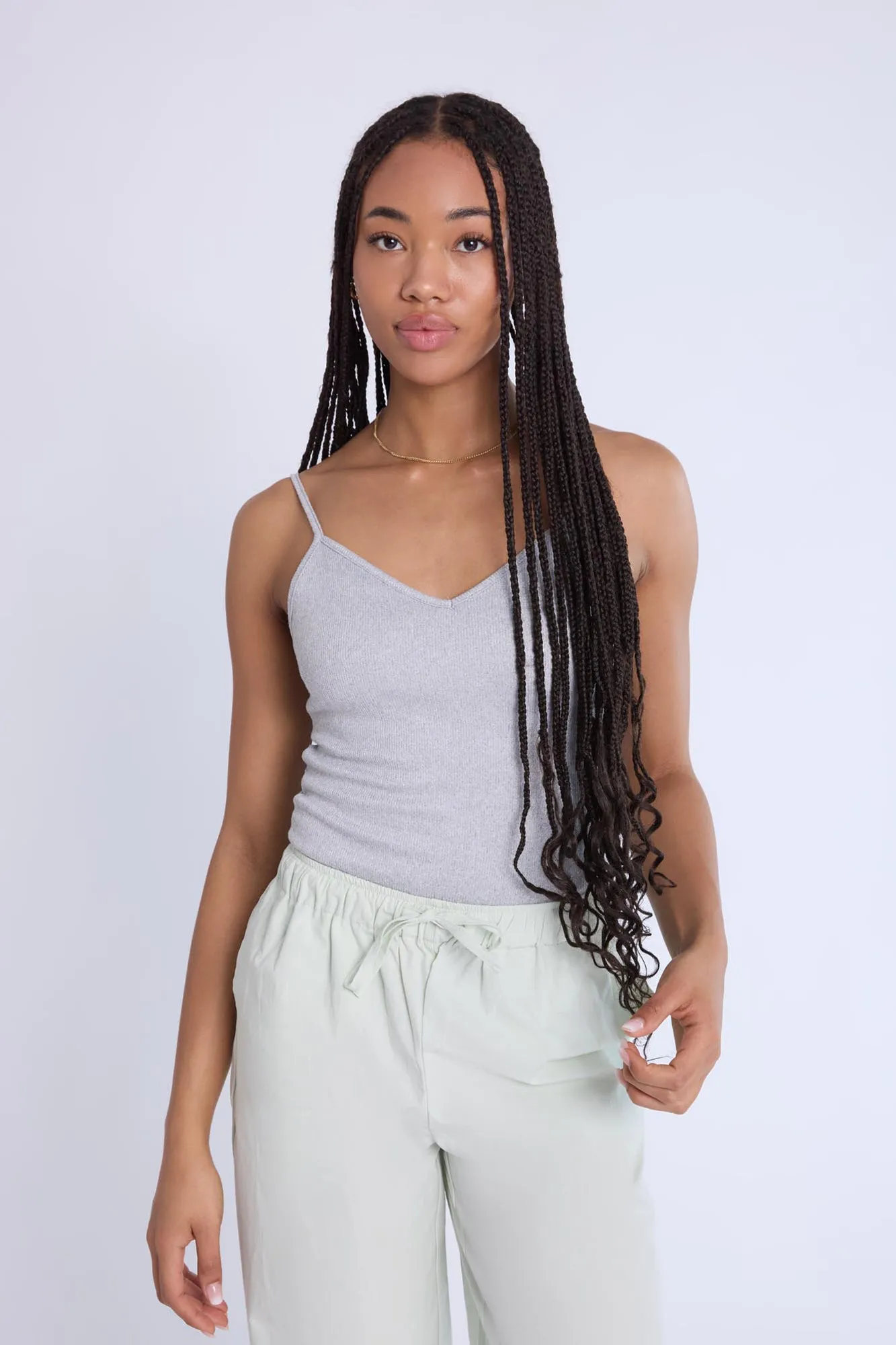 Super Soft Ribbed Cross-Back Bodysuit sold by Bluenotes