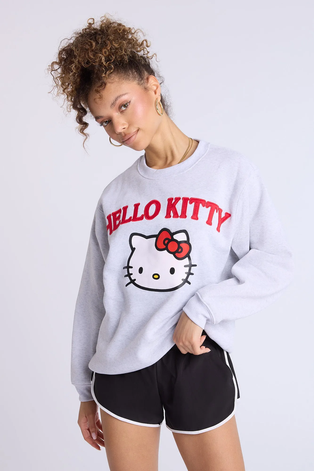 Hello Kitty Graphic Crew Neck Oversized Sweatshirt sold by Bluenotes