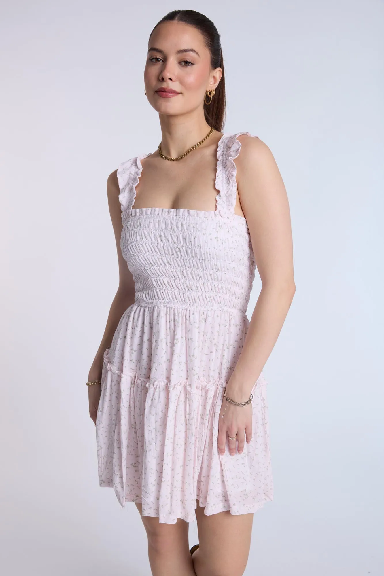 Smocked Tiered Mini Dress sold by Bluenotes