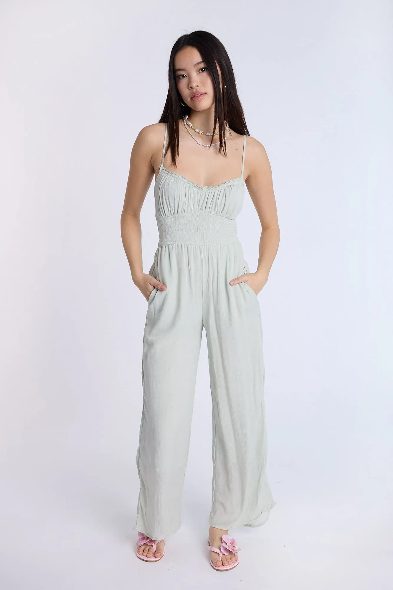 Smocked Waist Jumpsuit sold by Bluenotes
