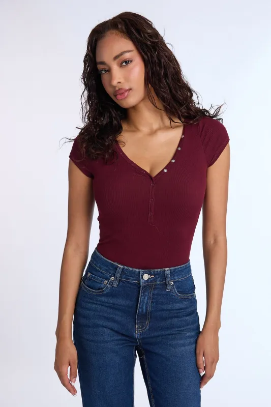 Super Soft Ribbed Short Sleeve Henley Bodysuit sold by Bluenotes