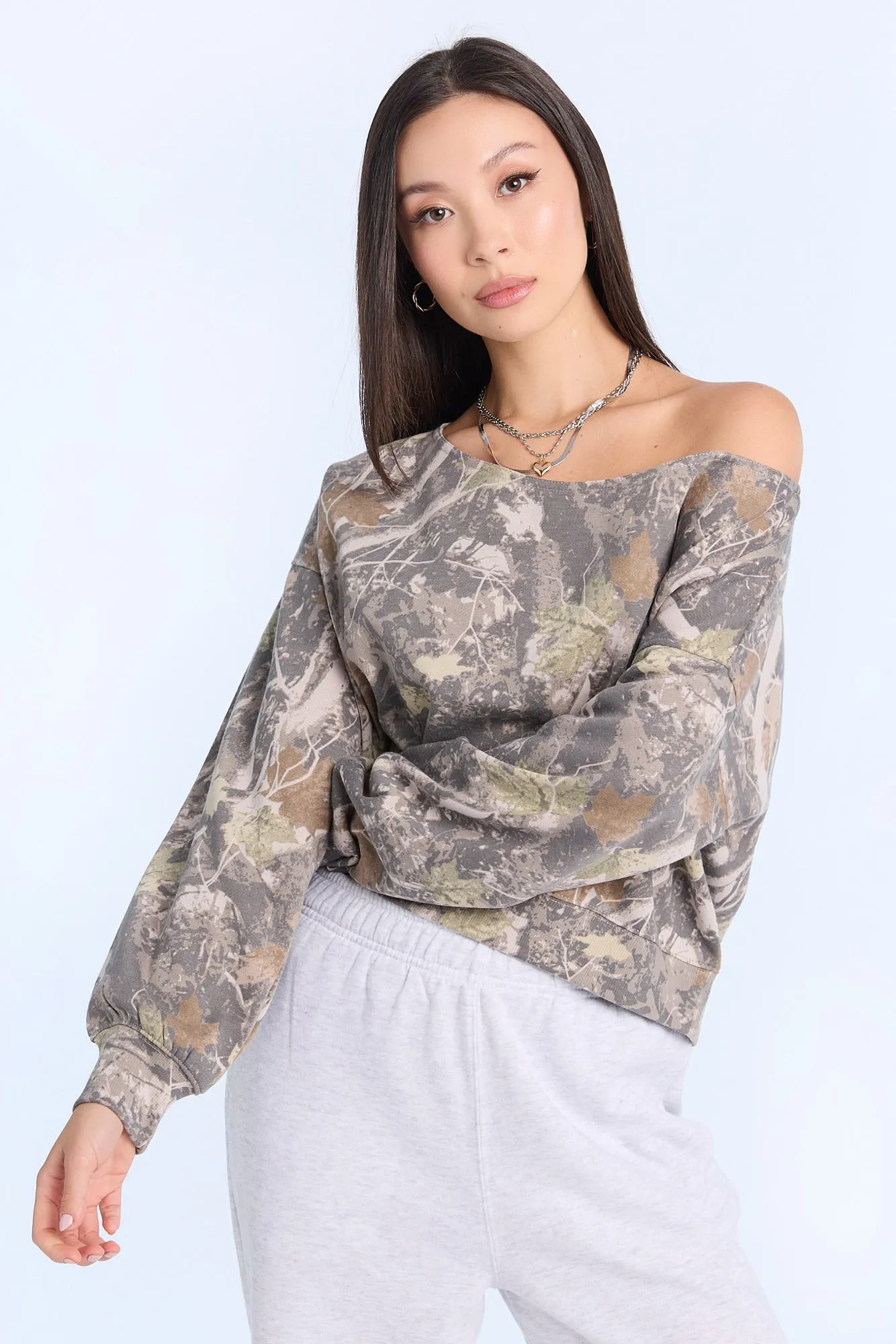 AERO Graphic Off-Shoulder Sweatshirt sold by Bluenotes