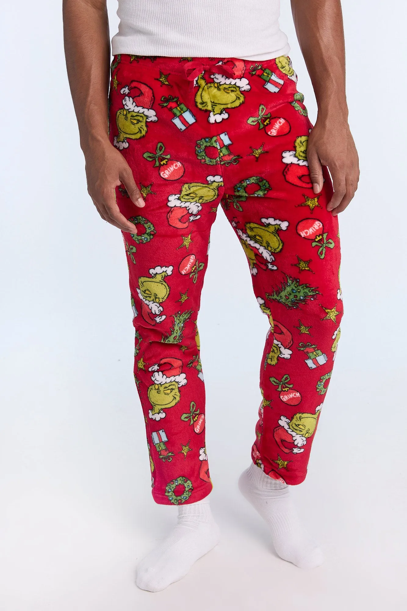 The Grinch Wreath Plush Pajama Pants sold by Bluenotes