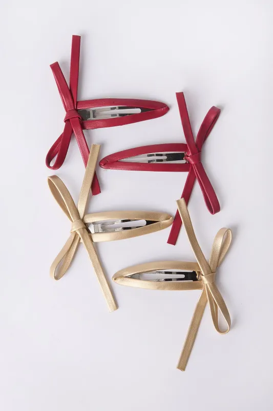 Bow Barrettes 4-Pack sold by Bluenotes